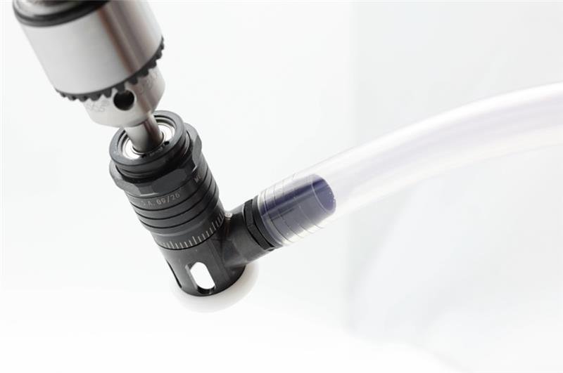 Microstop countersink cage with a vacuum skirt connected to a shop vacuum hose